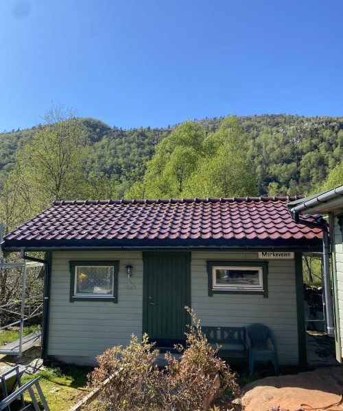 Takstein lagt av Haveland bygg